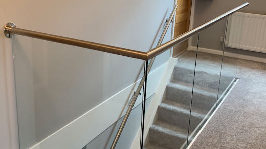 Stainless & glass balustrade install to stairs and landing